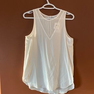 Club Monaco ladies gorgeous silk blouse in size extra small.